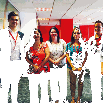 Team celebrating the successful launch of their process library
